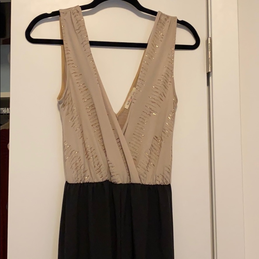 Wide leg Black and Tan jumpsuit with gold detail